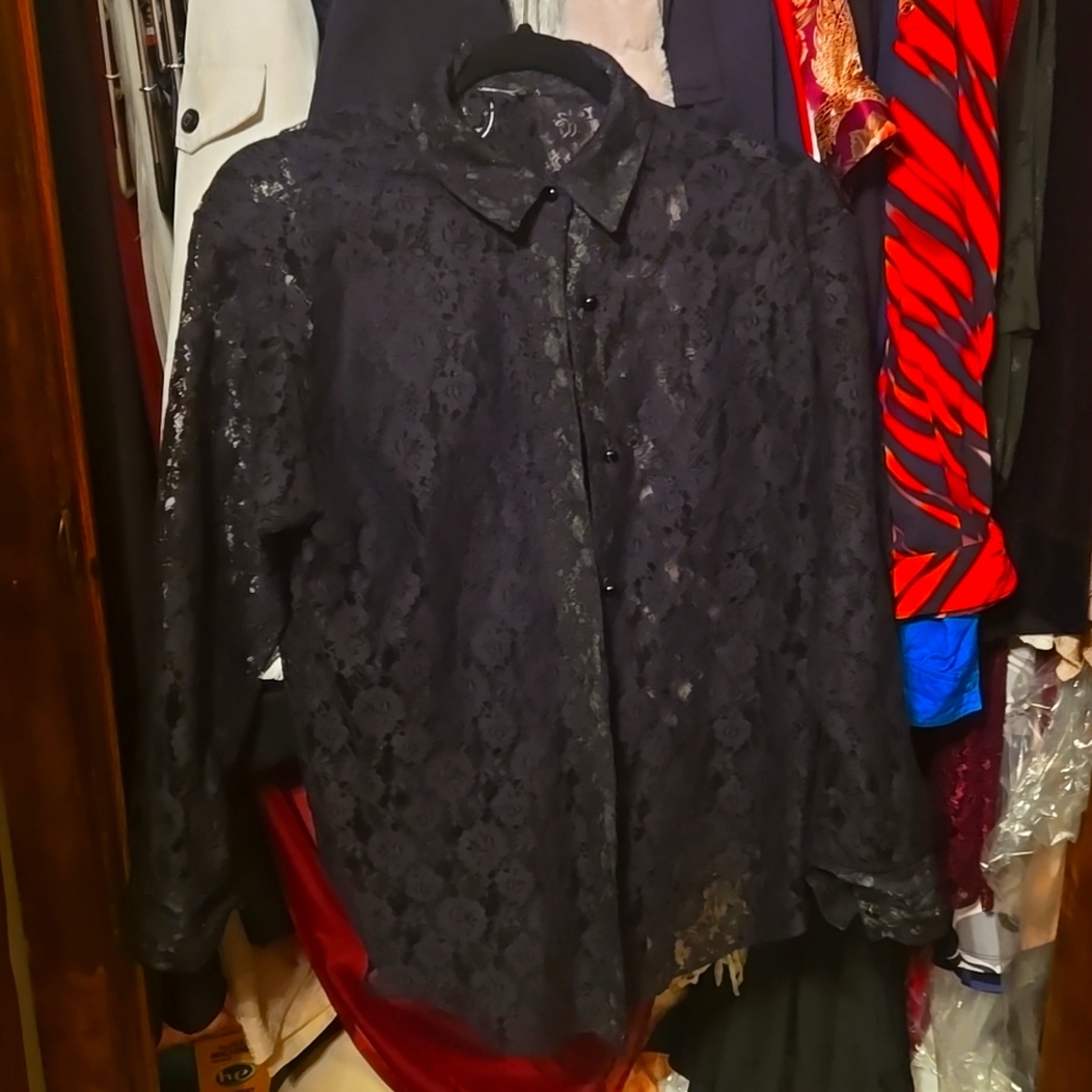 Black long sleeve button down top.